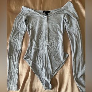 Light blue body suit